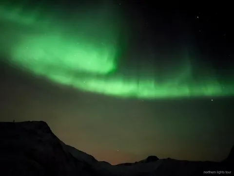 Professional photographer capturing the aurora on the private Iceland tour